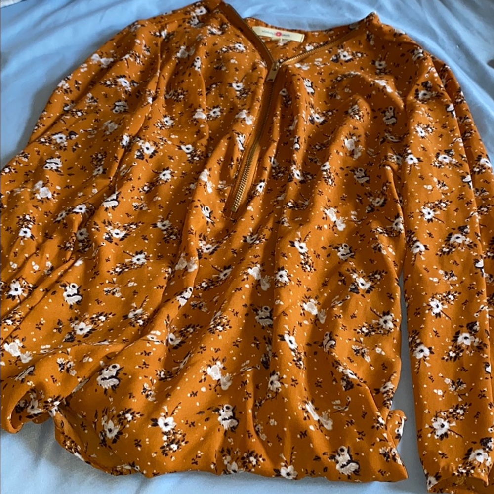 Burnt orange floral blouse